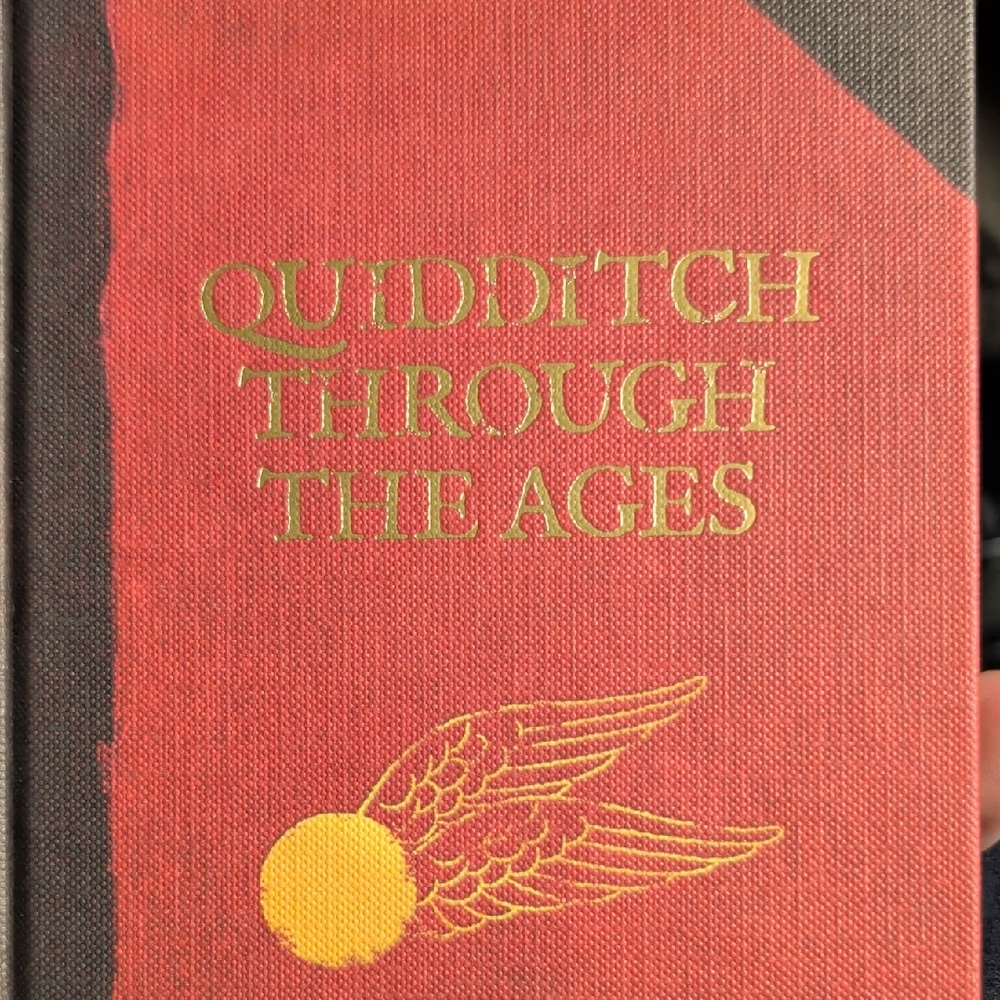 Quidditch Through the Ages Book - Red and Black Cover